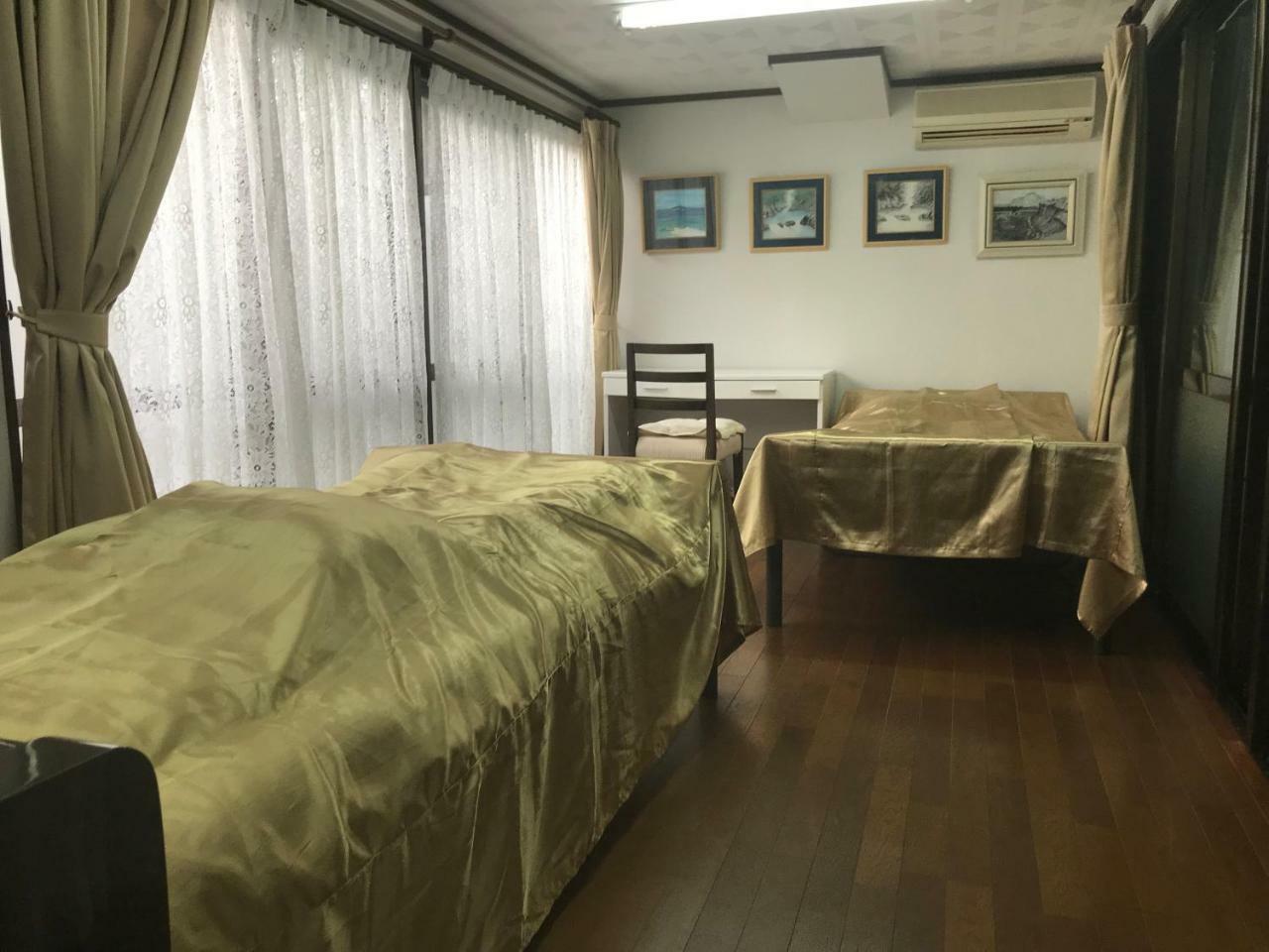 名護市多香奈アパートメント エクステリア 写真